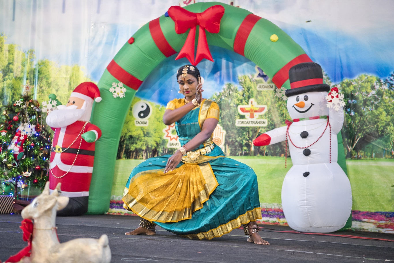 Amutha Kandasamy from Hridayam dance school performs the Bharathanatyum a classical South Indian dance. Pure Land Learning College Christmas party. Picture: Nev Madsen. Saturday 14th Dec, 2019