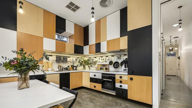 The kitchen table folds out from the bench “like a Swiss Army knife”.