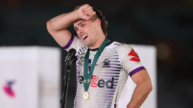 SYDNEY, AUSTRALIA - OCTOBER 25: Ryan Papenhuyzen of the Storm is presented with the Clive Churchill Medal during the 2020 NRL Grand Final match between the Penrith Panthers and the Melbourne Storm at ANZ Stadium on October 25, 2020 in Sydney, Australia. (Photo by Mark Kolbe/Getty Images)