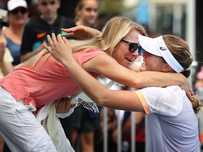 Olivia Gadecki embraces her mother Natalia after winning her first round match in the Australian Open. Picture: David Caird