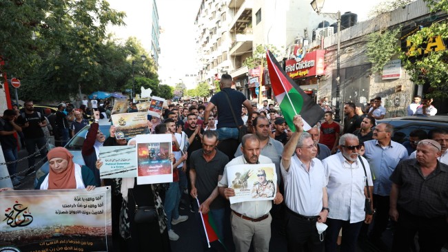 Demonstrators marching and calling for action after the attacks from Israel over the weekend. Picture: Issam Rimawi/Anadolu Agency via Getty Images