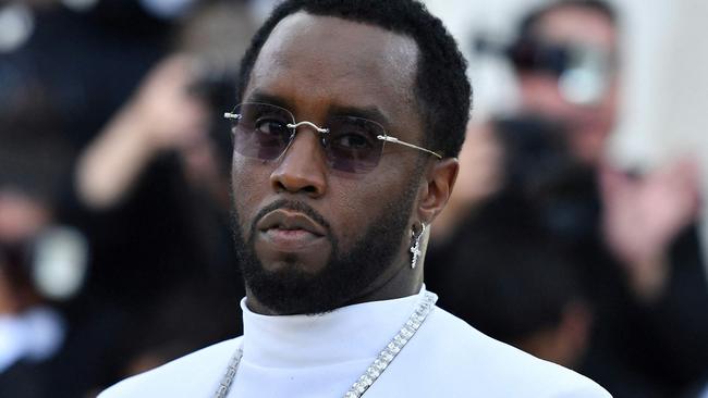 (FILES) Sean Combs arrives for the 2018 Met Gala on May 7, 2018, at the Metropolitan Museum of Art in New York. Music mogul Sean Combs is set to go on trial for racketeering and sex trafficking on May 5, 2025, a judge said in a court hearing October 10, 2024. The rapper known as "Diddy" will remain incarcerated, said federal judge Arun Subramanian, after he was indicted last month on three criminal counts that allege he sexually abused women and coerced them into drug-fueled sex parties using threats and violence. (Photo by Angela WEISS / AFP)