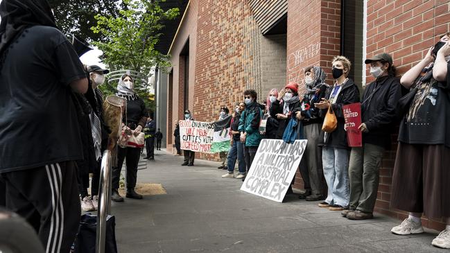 Pro-Palestinian activists block access to a University of Melbourne building. Picture: Matt Hrkac