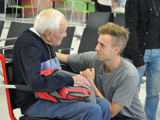 Professor David Goodall says goodbye to his grandson at Perth Airport. Picture: AAP/Sophie Moore