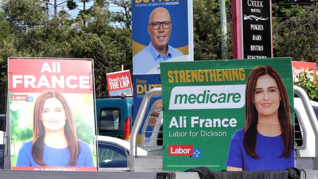 A tower of Corflutes signs at the polling booth on Old Gympie Rd Strathpine, in the seat of Dickson where Peter Dutton is the sitting Federal Member - on 26th April  2025 - Photo Steve Pohlner