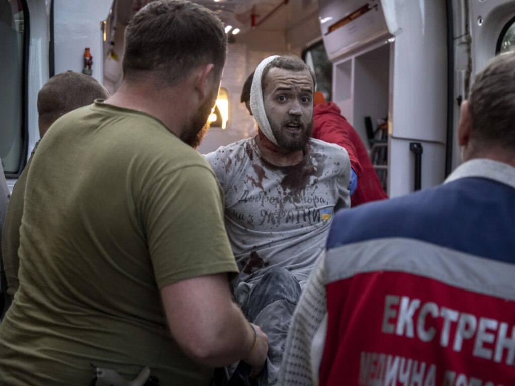 A man covered in blood after being injured in the blast that killed ten (Photo by Narciso Contreras/Anadolu Agency via Getty Images)