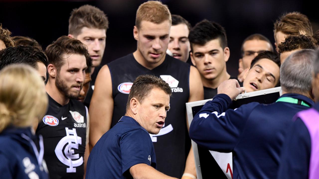 Brendon Bolton speaks to his players on Friday night. Picture: AAP Images