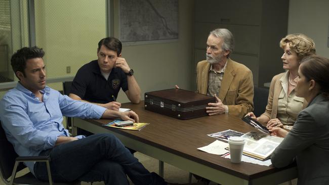 Under suspicion ... Ben Affleck, Patrick Fugit, David Clennon, Lisa Barnes and Kim Dickens in Gone Girl.