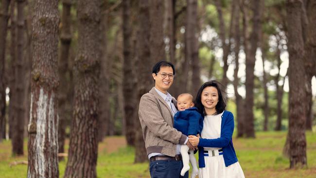 Campbelltown woman Sami Ho is a mum of two on a mission to cut down her energy use to save money. She is pictured with her husband and first child.