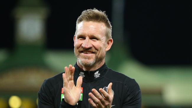 SYDNEY, AUSTRALIA - JUNE 14: Nathan Buckley, Senior Coach of the Magpies celebrates victory during the round 13 AFL match between the Melbourne Demons and the Collingwood Magpies at Sydney Cricket Ground on June 14, 2021 in Sydney, Australia. (Photo by Jason McCawley/AFL Photos/via Getty Images)