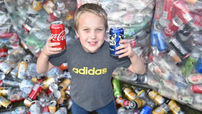 Caboolture nine-year-old Reegan Pellowe is collecting cans and bottles to raise money for sick children. Photo: Luke Simmonds.