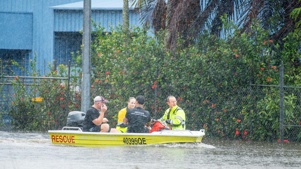 Water rescues during flooding in Cairns. Photo Supplied: Cockatours