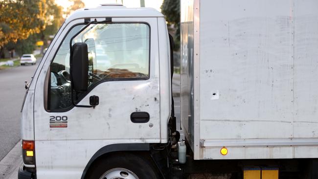 A bullet hole in a truck parked on Boundary Rd in Chester Hill. Picture: Damian Shaw