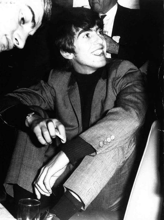 George Harrison mobbed by fans.