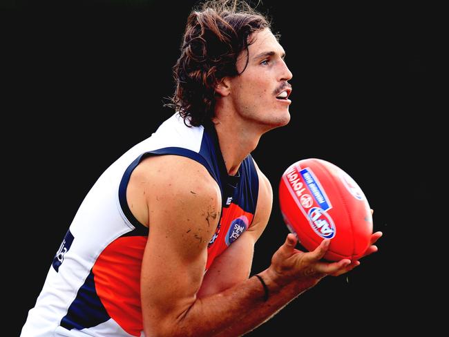 Phil Davis has grown his hair long since moving to the Giants. Pictures: Mark Evans