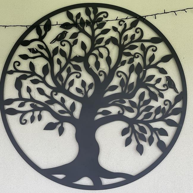 Tree of life that hangs on her patio wall at her Marian home. Picture: Janessa Ekert