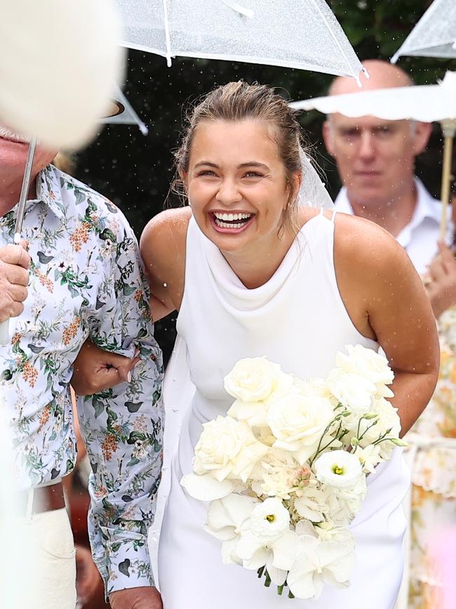 Giumelli took her dad’s arm as she walked down the aisle …