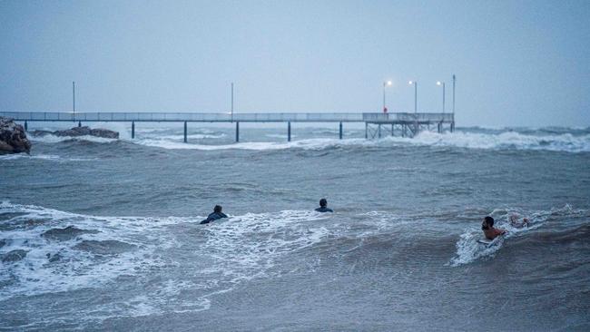 Top End Monsoon Surfing at the Nightcliff Beach, Darwin. Picture: Pema Tamang Pakhrin