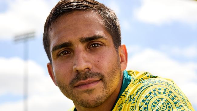 Rugby player Maurice Longbottom models the  Australian Olympic Team delegation and competition uniforms for Paris 2024, at the iconic Yurong Point (Mrs Macquarie’s Chair) in the Botanic Gardens in Sydney.  Picture: Supplied