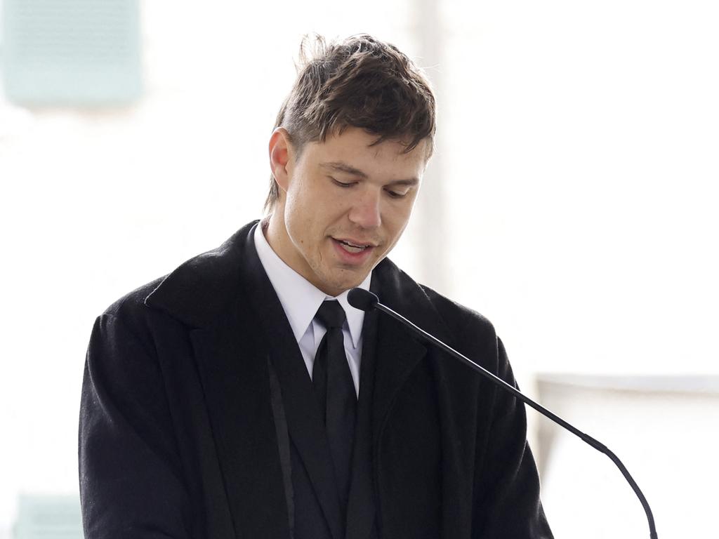 Australian Ben Smith-Petersen reads a tribute by his wife Riley Keough, Lisa Marie Presley's daughter, at the public memorial for Lisa Marie Presley. Picture: AFP