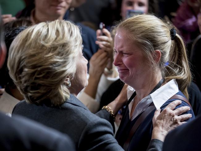 Hillary Clinton comforts a supporter after conceding her defeat to Donald Trump after the hard-fought presidential election. Picture: AP Photo/Andrew Harnik