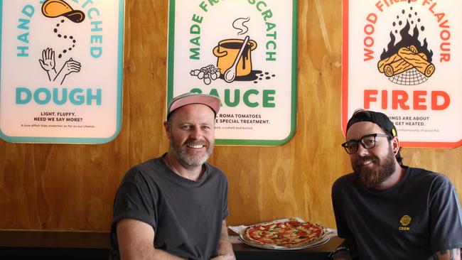 Tim Anderson and Mark McInerney inside the new One Sneaky Cheetah at Modbury North which opened last week. Picture: About Media Group