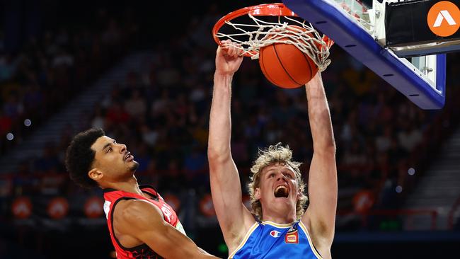 BRISBANE, AUSTRALIA - NOVEMBER 17: Rocco Zikarsky of the Bullets dunks during the round nine NBL match between Brisbane Bullets and Perth Wildcats at Brisbane Entertainment Centre, on November 17, 2024, in Brisbane, Australia. (Photo by Chris Hyde/Getty Images)