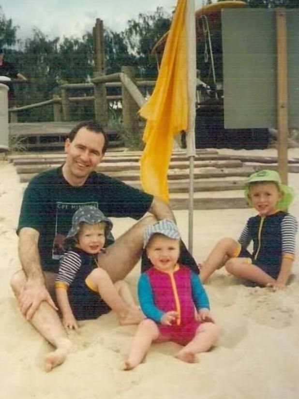 Dr Andrew Bryant with his children when they were young. From left, Alex, John and Charlotte. Picture: Supplied.