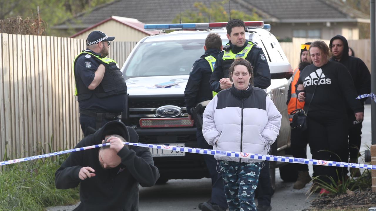 Police and family at the scene in Broadmeadows where four bodies were found by a neighbour. Picture: NewsWire / David Crosling