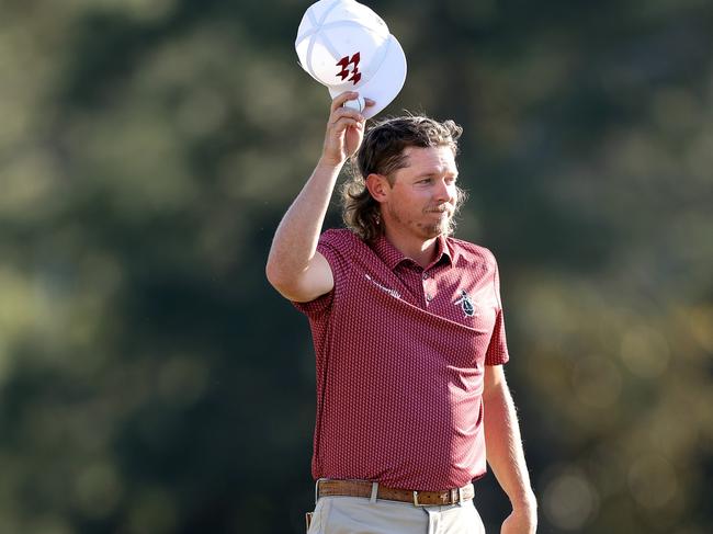 AUGUSTA, GEORGIA - APRIL 14: Cameron Smith of Australia reacts on the 18th green during the final round of the 2024 Masters Tournament at Augusta National Golf Club on April 14, 2024 in Augusta, Georgia. (Photo by Warren Little/Getty Images)