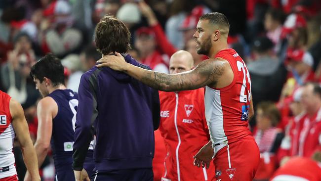 Sydney's Lance Franklin with Fremantle's Joel Hamling after Saturday night’s clash Picture. Phil Hillyard