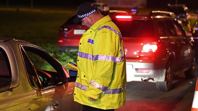 Police officers conduct alcohol and drug tests at a testing station on Port Wakefield Road, Mawson Lakes. Picture: Tom Huntley