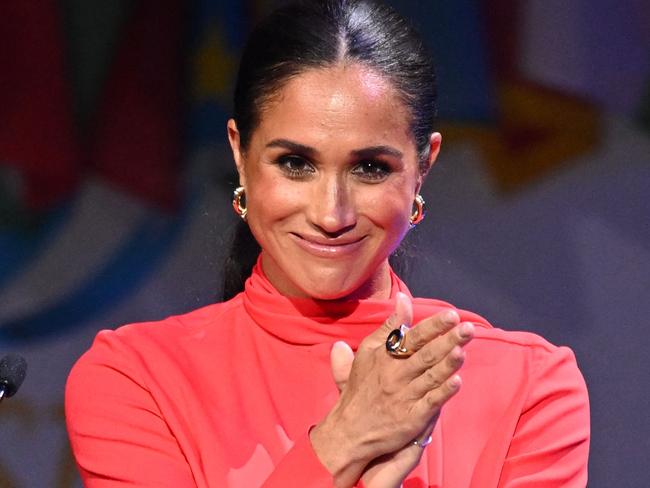 Meghan Markle said it was ‘very nice to be back in the UK’. Picture: AFP