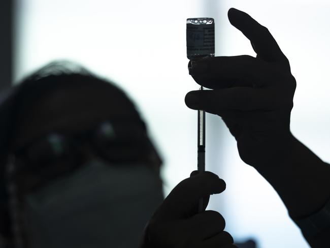 A healthcare worker prepares a dose of the AstraZeneca vaccine. Picture: Getty Images