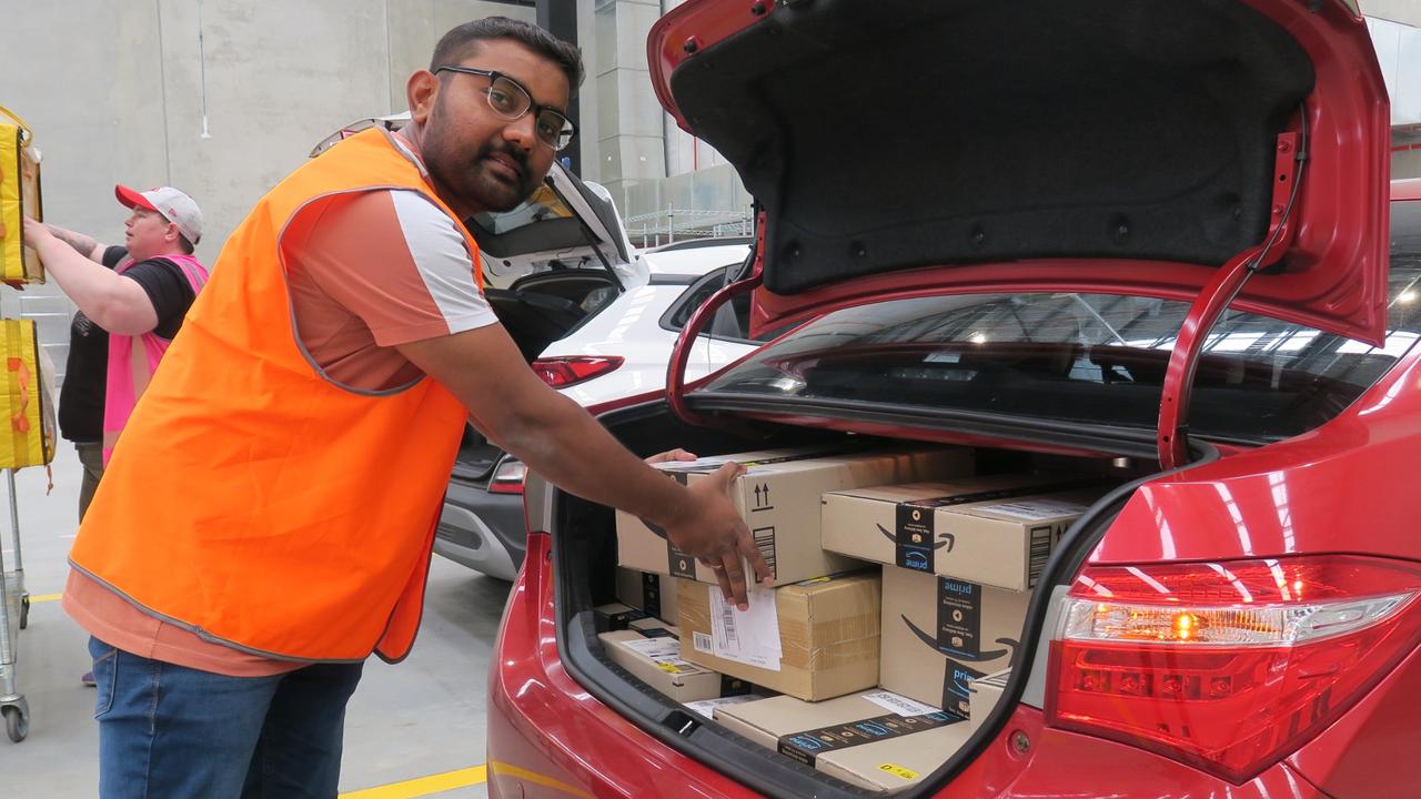 Amazon Flex uses self-employed gig economy delivery drivers such as Venkatesh Sripathi, pictured at its West Gosford distribution centre. Picture: NewsLocal