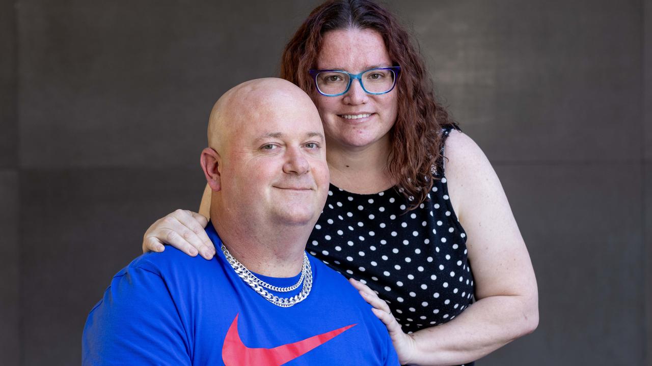 Daniel Woolley with wife Carly Woolley, he was airlifted after a crash seven years ago, and is now a traffic safety educator. Picture: Kelly Barnes