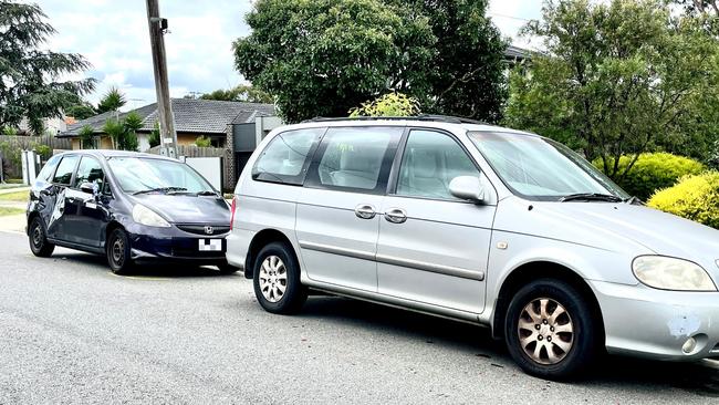 Pieces of glass, believed to be from the offending driver’s lights and mirror, can be seen on the road where a woman was struck by a car on Saturday night.