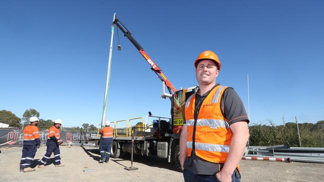 Jason Morris runs Yatala firm Mi Electric. Photo by Richard Gosling