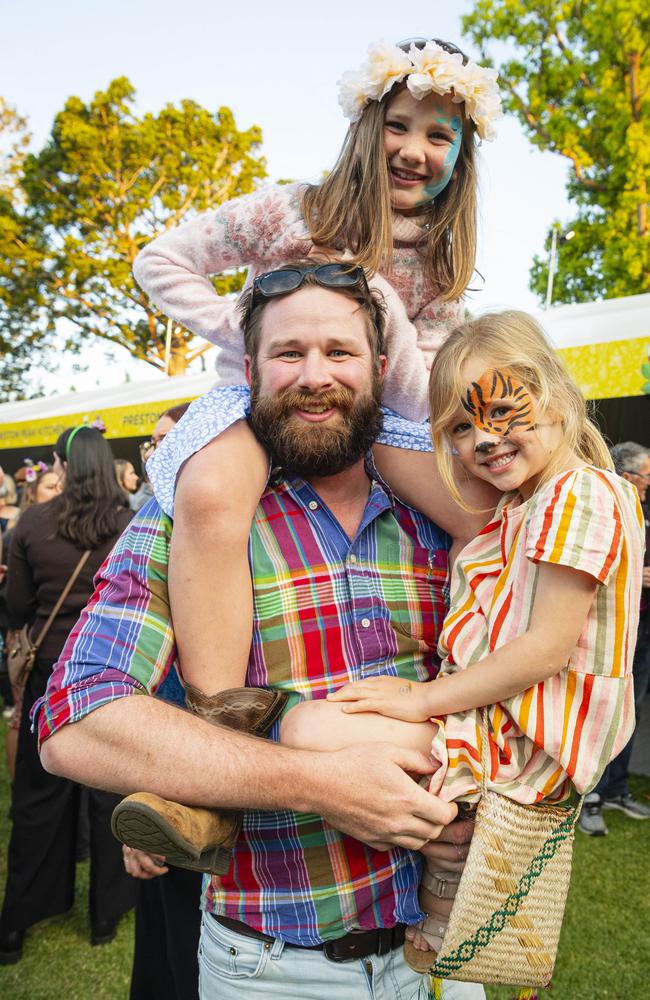 Kim McGregor with his daughters Eleanor (top) and Neave McGregor at the Toowoomba Carnival of Flowers Festival of Food and Wine, Saturday, September 14, 2024. Picture: Kevin Farmer