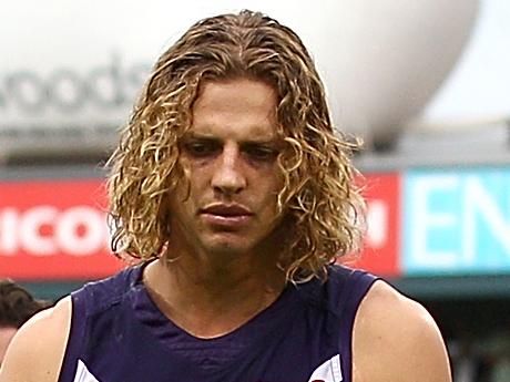 PERTH, AUSTRALIA - APRIL 24: Nathan Fyfe of the Dockers leads the team from the field on crutches after being defeated during the round five AFL match between the Fremantle Dockers and the Carlton Blues at Domain Stadium on April 24, 2016 in Perth, Australia. (Photo by Paul Kane/Getty Images)