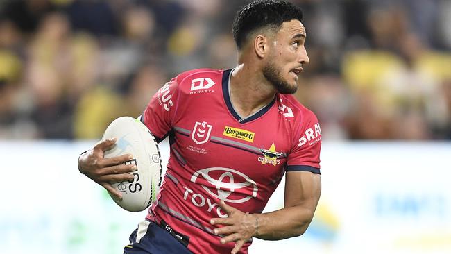 TOWNSVILLE, AUSTRALIA - AUGUST 14:  Valentine Holmes of the Cowboys runs the ball during the round 22 NRL match between the North Queensland Cowboys and the Wests Tigers at QCB Stadium, on August 14, 2021, in Townsville, Australia. (Photo by Ian Hitchcock/Getty Images)