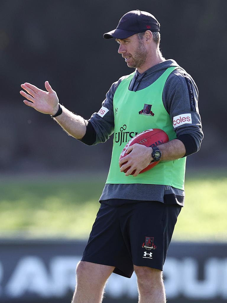 Ben Rutten takes Essendon training on Friday. Picture: Michael Klein