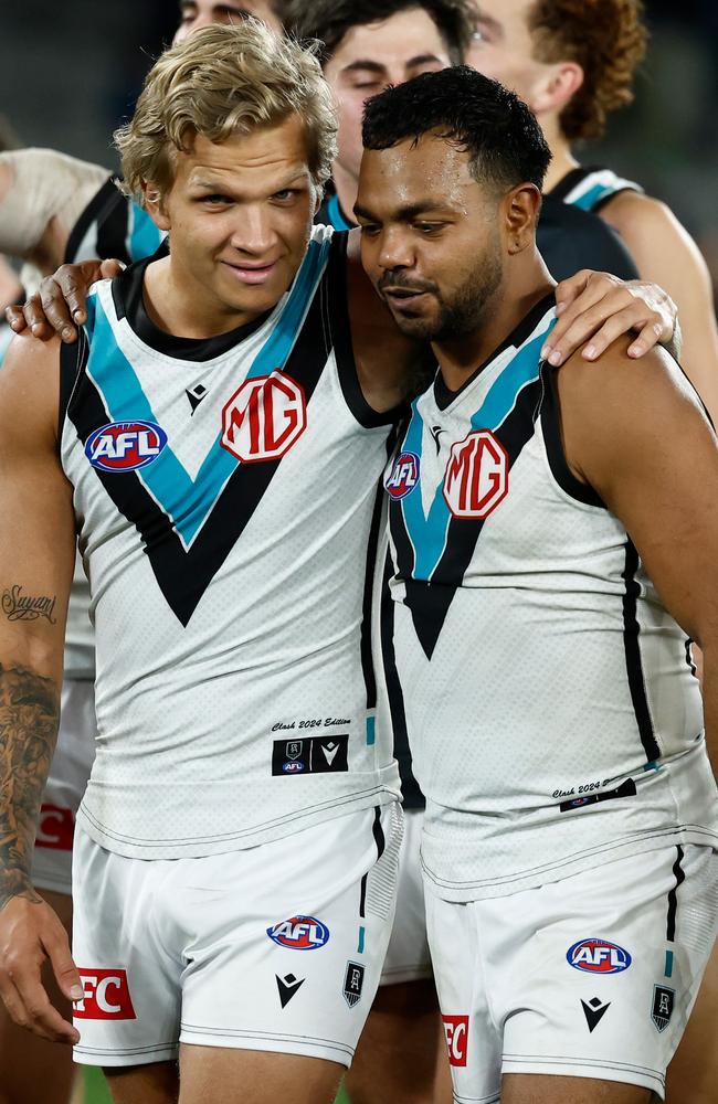 Quinton Narkle and Willie Rioli celebrate after Port Adelaide’s win on Friday night. Picture: Michael Willson/AFL Photos via Getty Images.