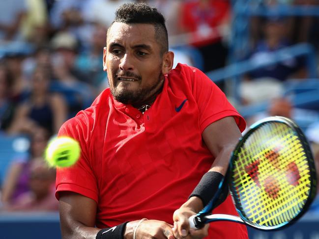 MASON, OH - AUGUST 20:  Nick Kyrgios of Australia Grigor returns a shot to Dimitrov of Bulgaria during the men's final during Day 9 of of the Western and Southern Open at the Linder Family Tennis Center on August 20, 2017 in Mason, Ohio.  (Photo by Rob Carr/Getty Images)