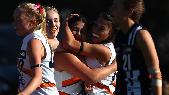 Calder Cannons players celebrate a goal in the preliminary final.