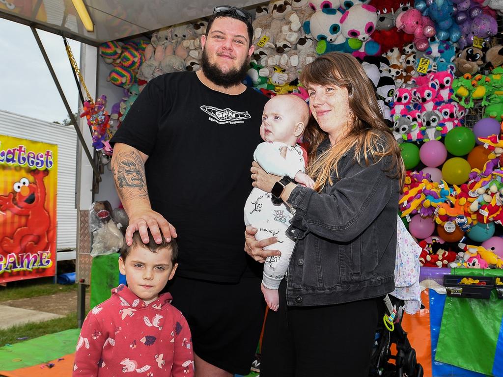 Lismore residents Hayden Murphy with Caileigh and Caiden Murphy and Cody Duff enjoying some games in sideshow alley at the Lismore Show. Picture: Cath Piltz