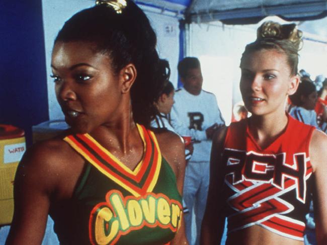 Actress Kirsten Dunst (R) in 2000 film "Bring It On",  movies scene  /it /on