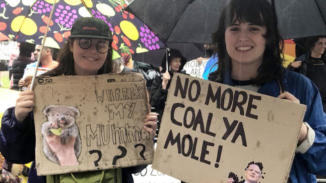 Climate change protesters Imogen and Marie during a rally in Melbourne. Picture: Tessa Akerman