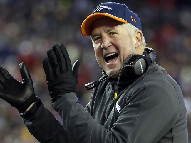 FILE - In this Nov. 2, 2014, file photo, then-Denver Broncos head coach John Fox cheers for his team from the sideline against the New England Patriots in the first half an NFL football game in Foxborough, Mass. The Chicago Bears have reached an agreement with John Fox to become the teams head coach, Friday, Jan. 16, 2015. (AP Photo/Steven Senne, File)