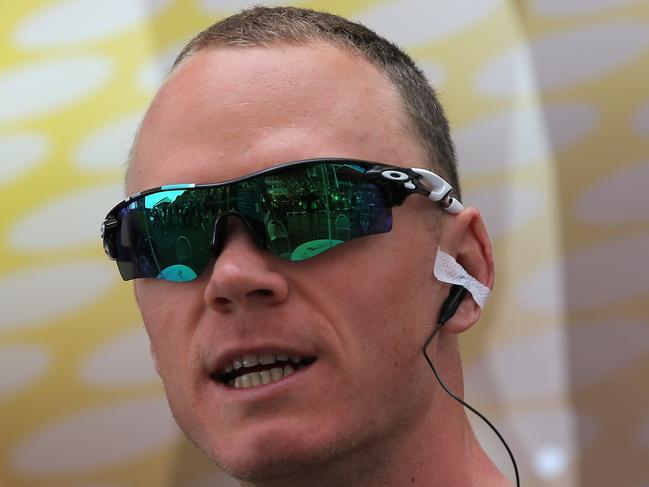 YORK, ENGLAND - JULY 06: Chris Froome of Great Britain and Team Sky looks on during sign in prior to stage two of the 2014 Le Tour de France from York to Sheffield on July 6, 2014 in York, United Kingdom. (Photo by Doug Pensinger/Getty Images)